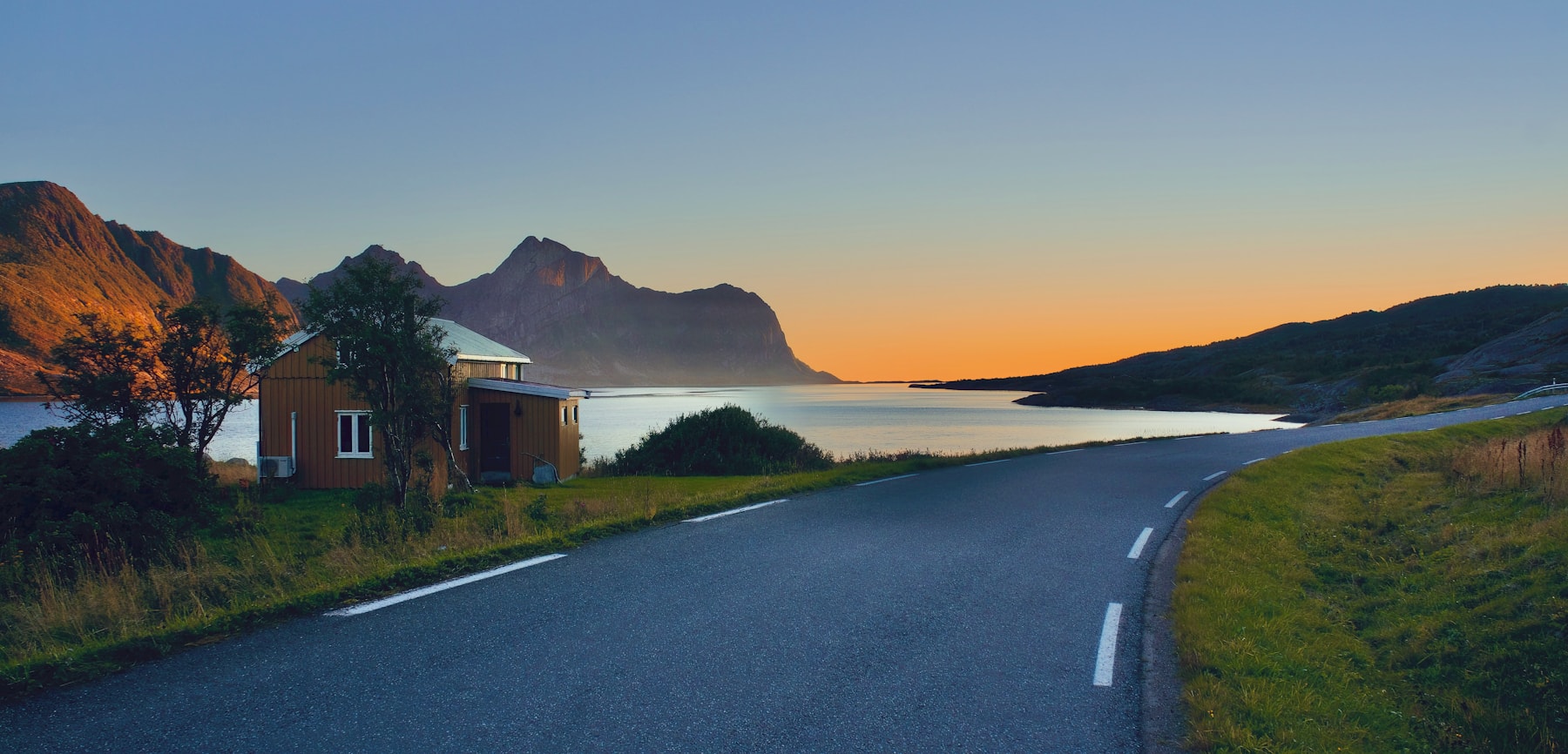 Remote coastal route beside northern water